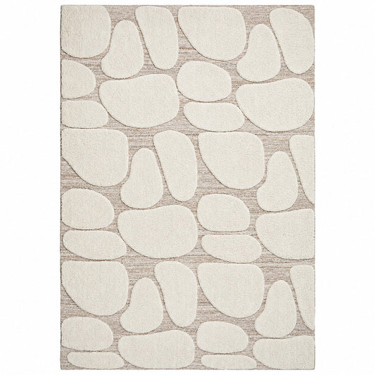 Leather Gallery Sasso Rug in Dune Cream, featuring raised organic cream shapes on a textured beige background.