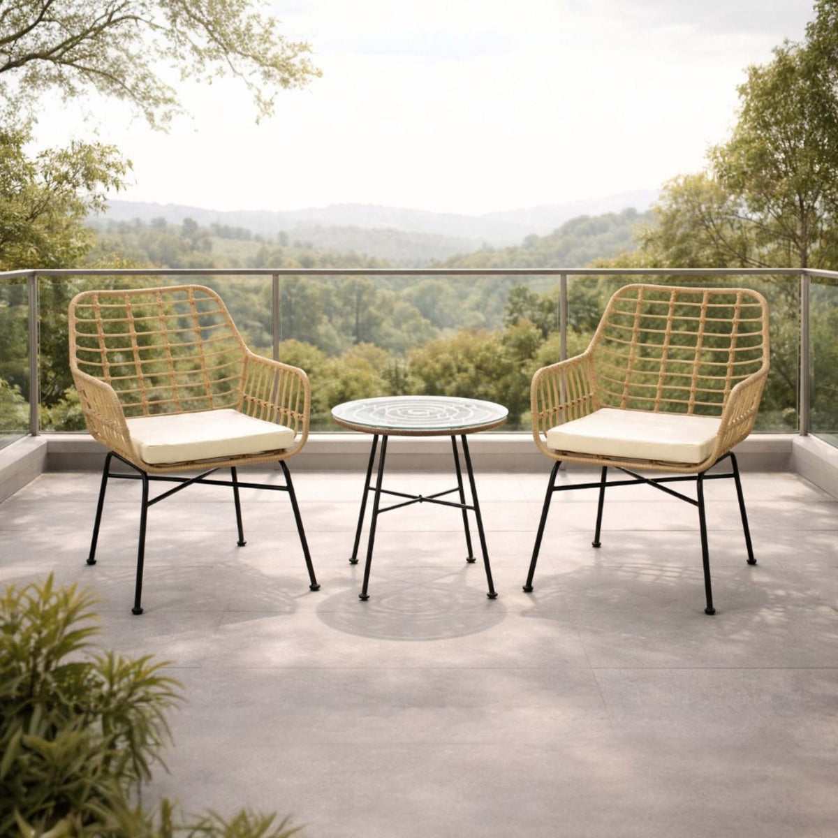 Gallery Everyday Sedona Patio Chairs and Table Set of 3, featuring two wicker chairs and a round table on a balcony with a scenic view.