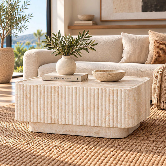 Gallery Everyday Serra Coffee Table in Seashell, featuring a square stone-look design with fluted detailing in a warm cream finish.