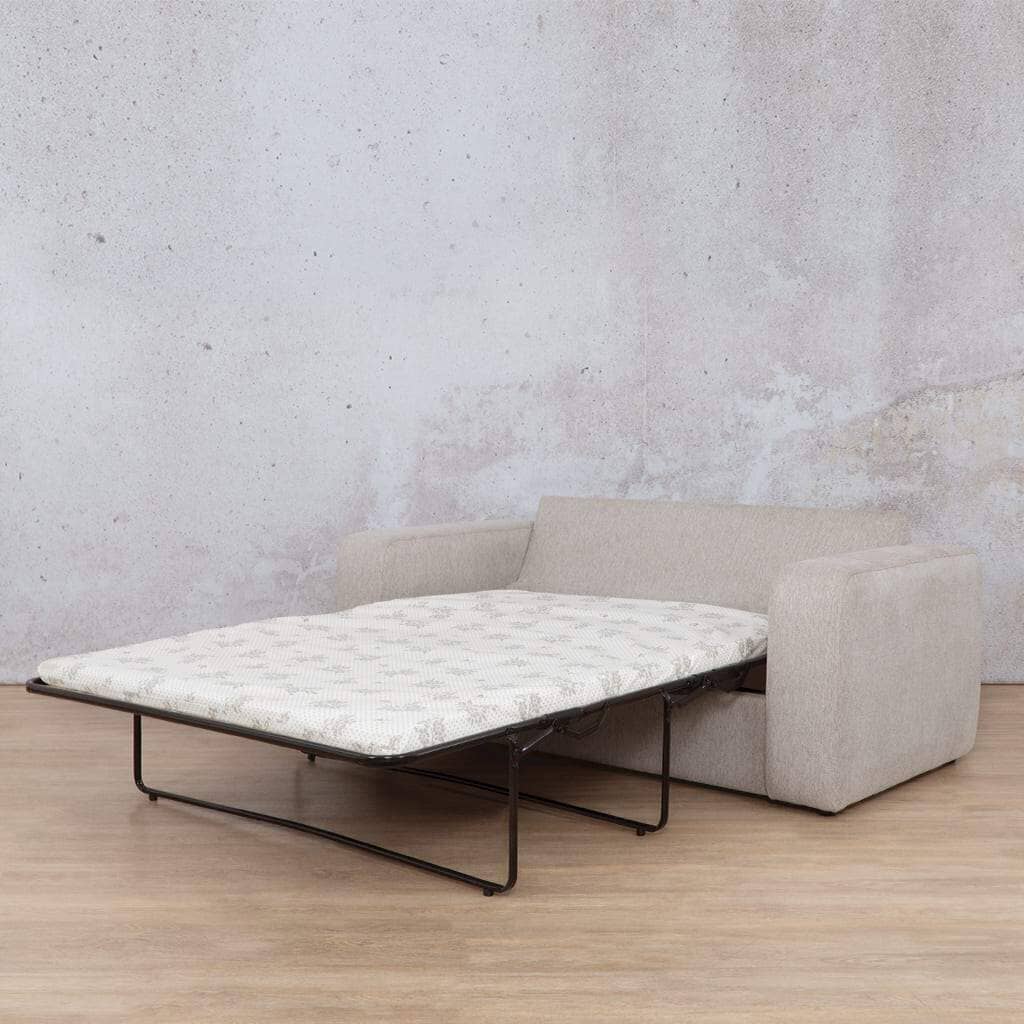 Leather Gallery’s Stanford fabric sleeper couch fully extended as a bed, offering a comfortable and stylish sleeper couch solution. Perfect for homes needing a versatile sleeper couch for guests. oyster