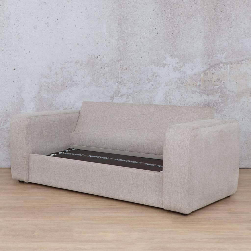 Leather Gallery’s Stanford fabric sleeper couch with seat cushion removed, revealing the unfolding bed mechanism. This practical sleeper couch effortlessly converts from a stylish sofa to a spacious sleeper couch for guests. oyster