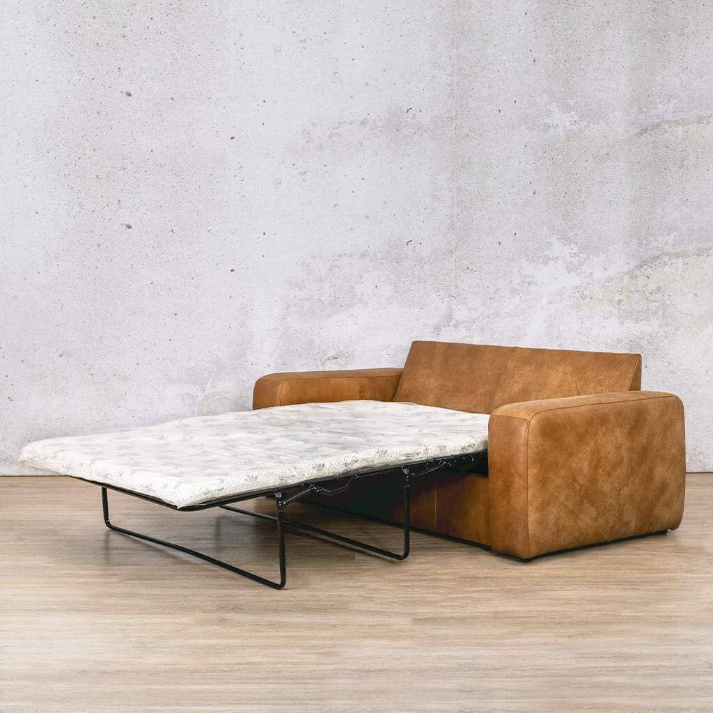 Stanford leather sleeper couch folded out into a bed, providing a comfortable and stylish sleeping space for guests. Buy your sleeper couch today. Czar pecan