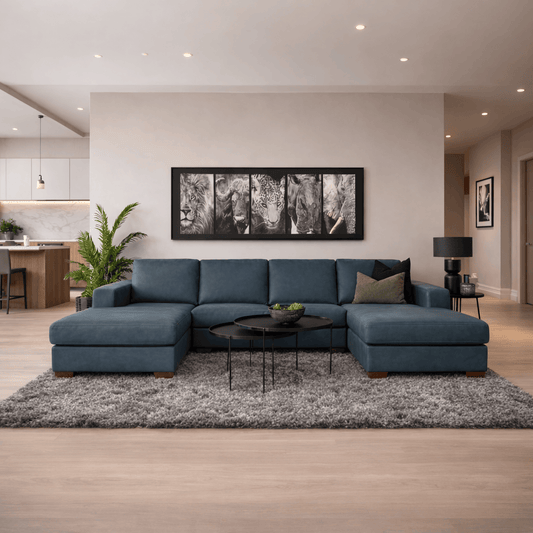 Stanford Leather U shape couch in flux blue, shown in a minimalist lounge setting. | U shaped couch, couches for sale, modular couch, blue couch, chaise lounge 