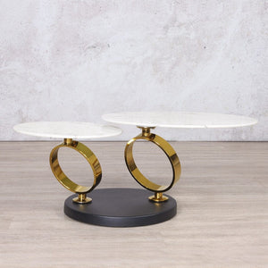 The swivel stainless steel marble look top coffee table - gold is a modern statement piece for your living room. Its swivel design and luxurious marble look top make this coffee table a functional and elegant addition to your space.