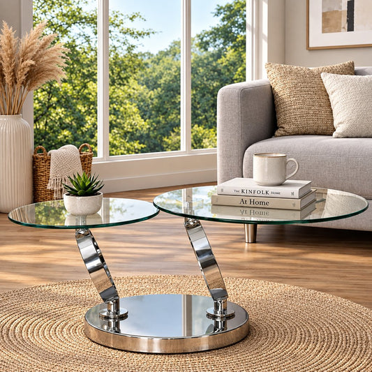 Leather Gallery Swivel Stainless Steel Glass Coffee Table in Silver, featuring a glass top and polished metal base in a modern living room.