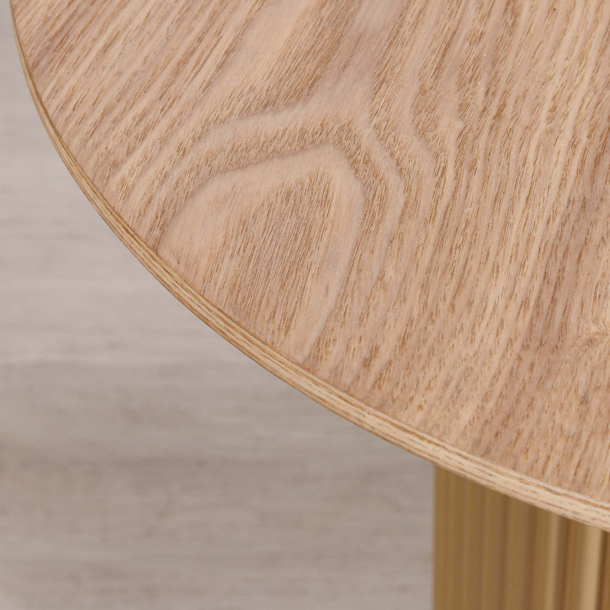 Close-up of the Gallery Everyday Sybil Side Table in Natural, showing the light oak wood grain and fluted pedestal base.
