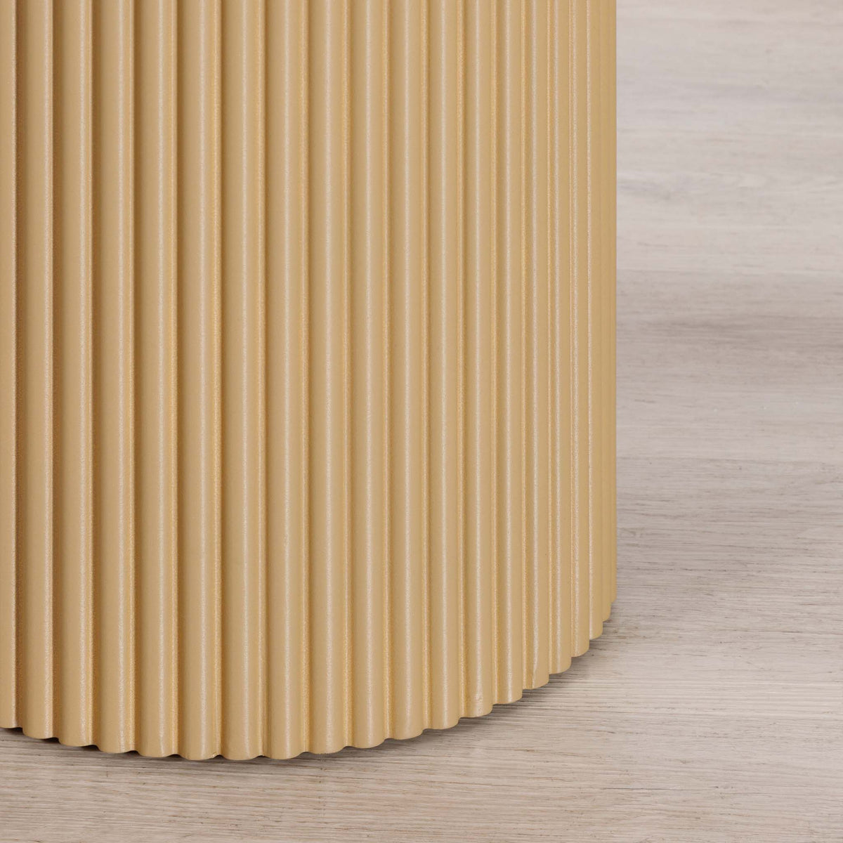 Close-up of the Gallery Everyday Sybil Side Table in Natural, showing the fluted cylindrical pedestal base in a warm tan finish.