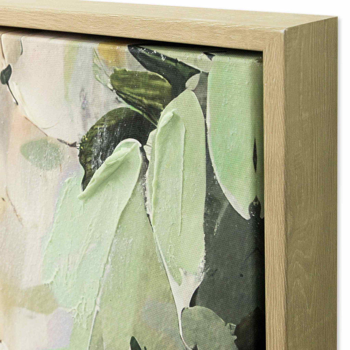 Close-up of the Leather Gallery Sylvan Descent Framed Artwork, showing the floral design and wooden frame.