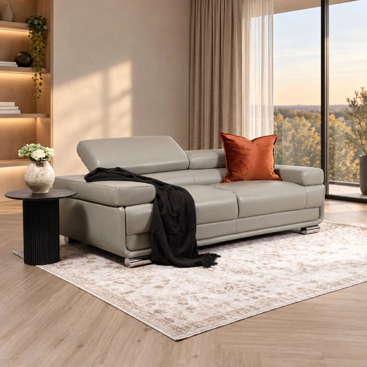 Leather Gallery Tobago 3 Seater Leather Couch in Grey, featuring light leather upholstery and polished silver metal legs.
