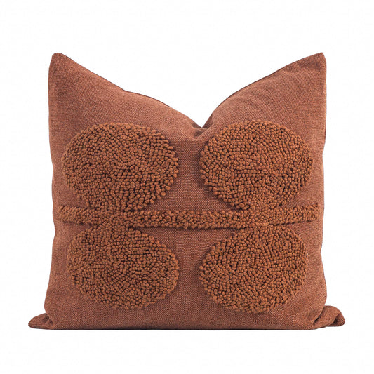 Leather Gallery Halo Calabarian Orange Cushion, featuring raised circular tufted detailing in a rich warm orange finish.