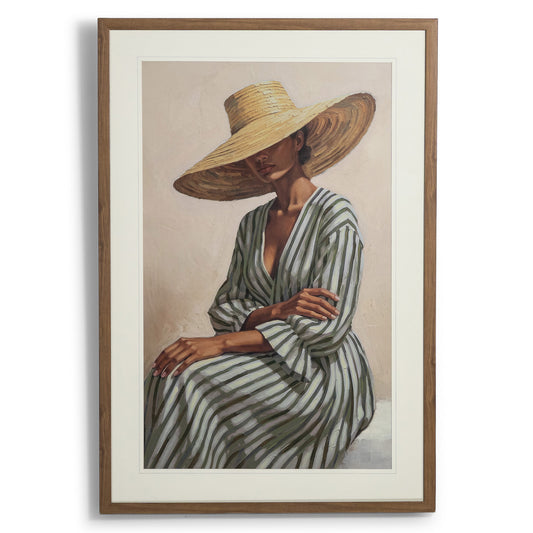 Belladonna I - Kia Artwork by Leather Gallery featuring a seated woman in a striped dress and oversized woven sunhat, framed in natural wood tones.