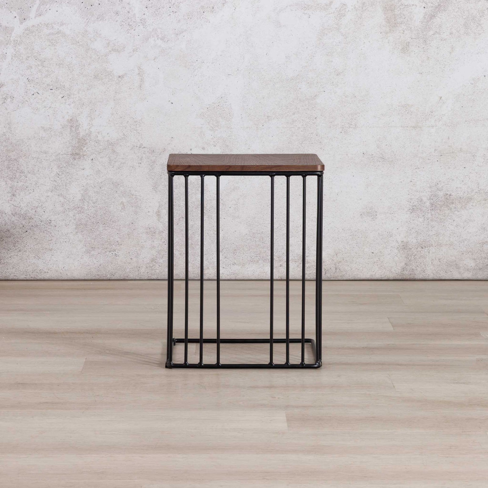 Gallery Everyday Camila Side Table in Walnut, featuring a dark brown rectangular wood top and black metal wire-frame base.