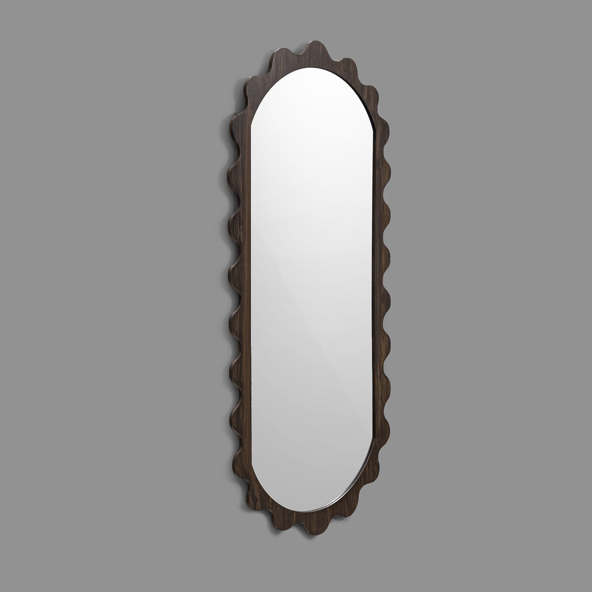 Leather Gallery Morgana Wall Mirror in Brown, featuring an elongated scalloped frame with an antique-glaze finish.