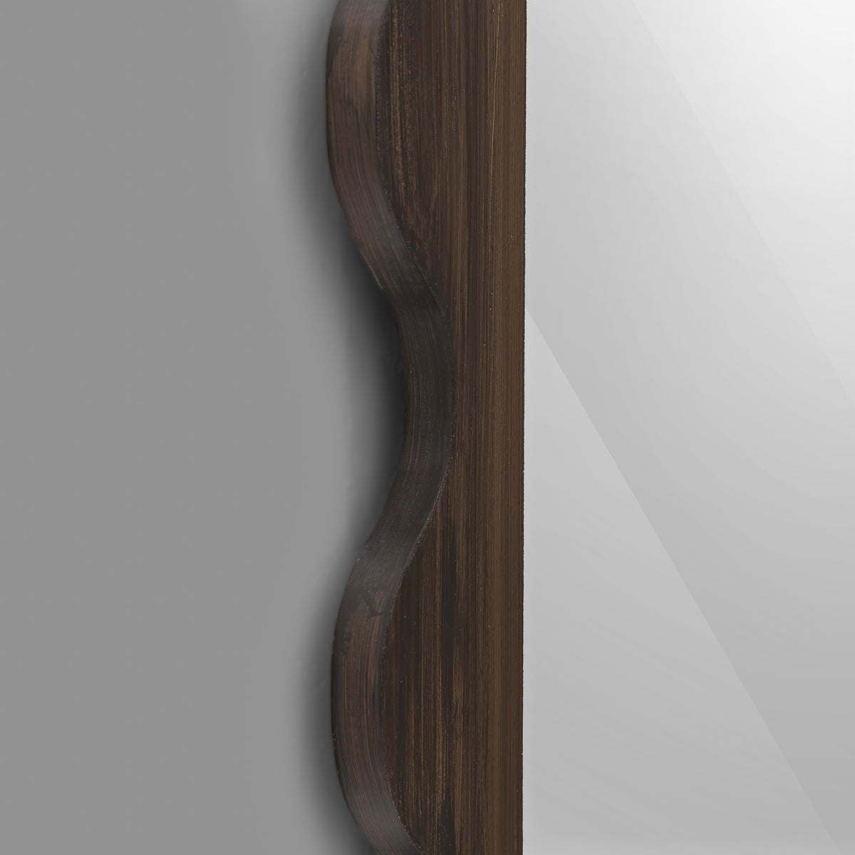 Leather Gallery Morgana Wall Mirror in Brown, featuring an elongated scalloped frame with an antique-glaze finish.