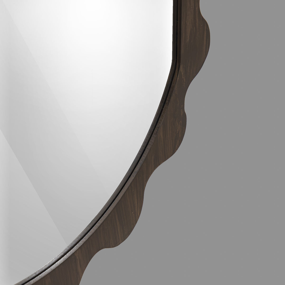 Leather Gallery Morgana Wall Mirror in Brown, featuring an elongated scalloped frame with an antique-glaze finish.
