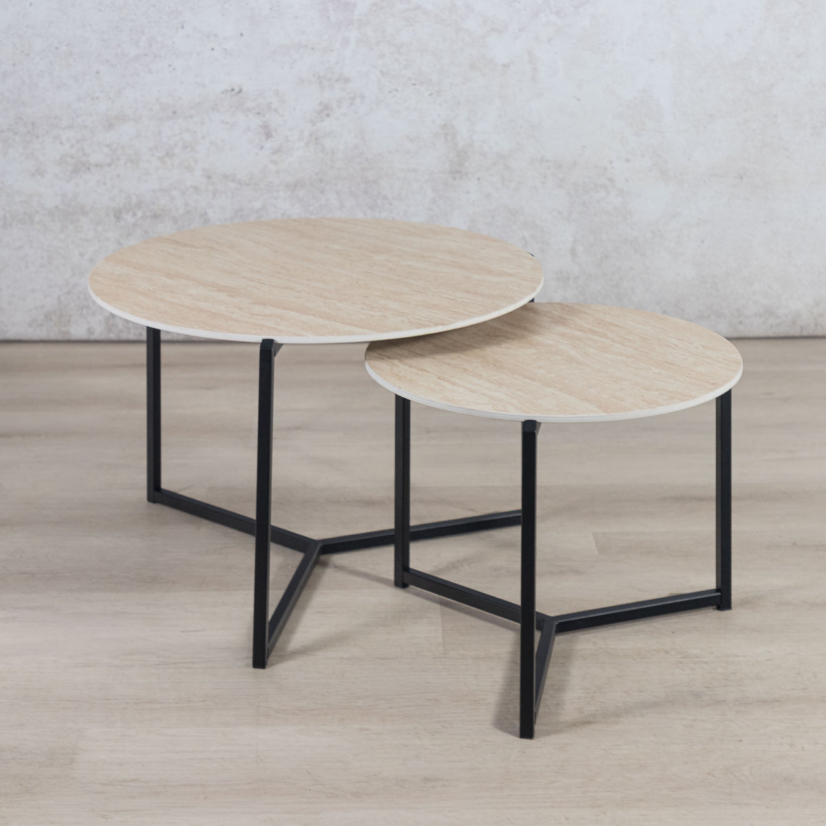 Gallery Everyday Callum Nesting Coffee Tables Set of 2, featuring light wood tops and slim black metal frames.