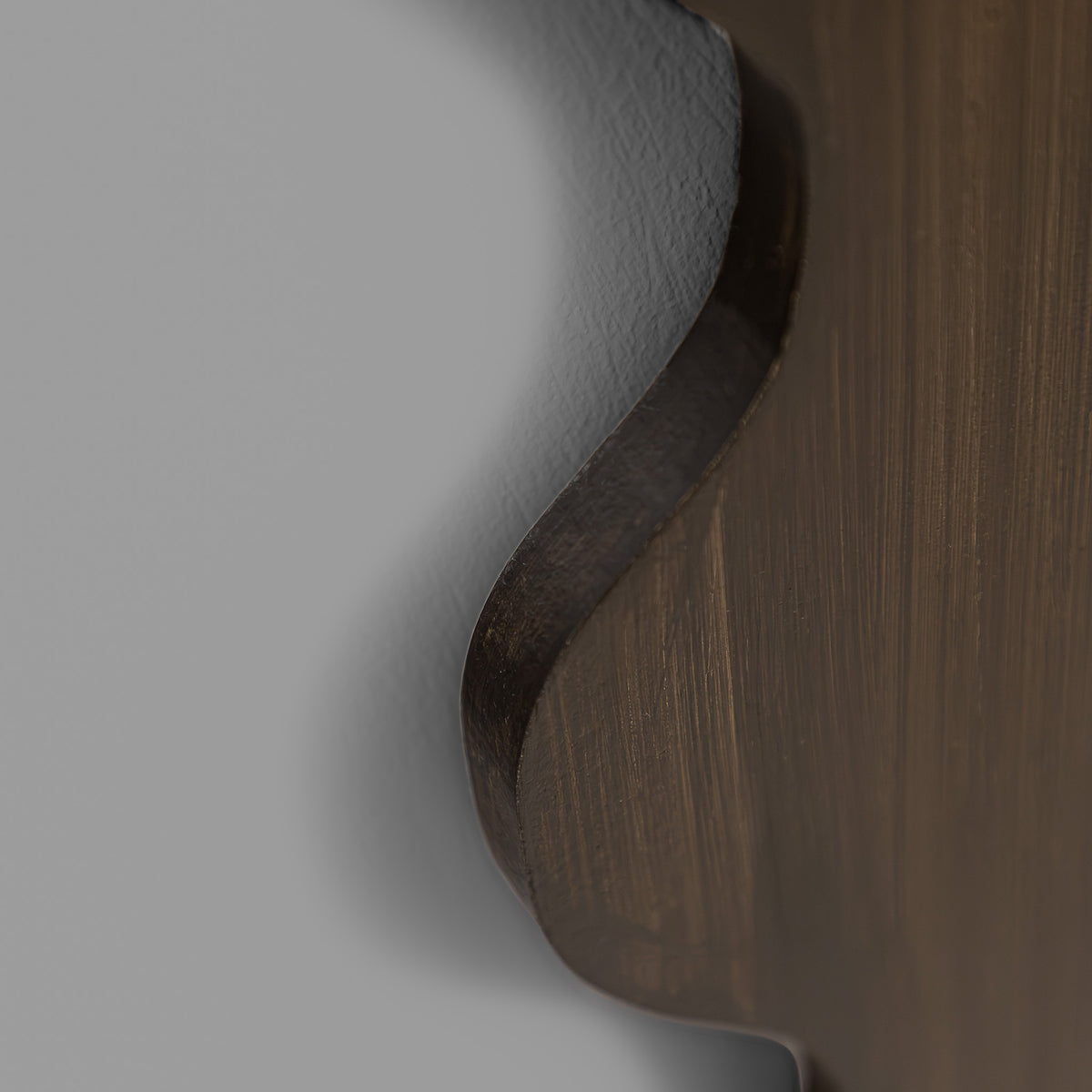 Leather Gallery Morgana Wall Mirror in Brown, featuring an elongated scalloped frame with an antique-glaze finish.