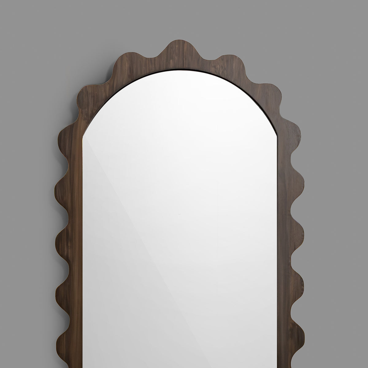 Leather Gallery Morgana Wall Mirror in Brown, featuring an elongated scalloped frame with an antique-glaze finish.