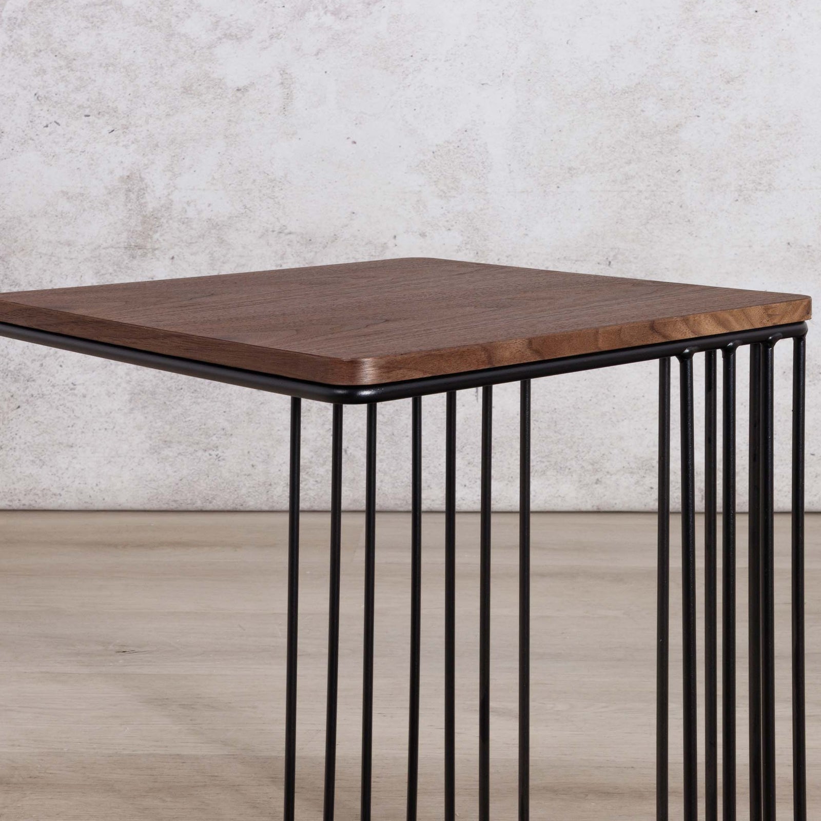 Gallery Everyday Camila Side Table in Walnut, featuring a dark wood square top and black metal wire-frame base.