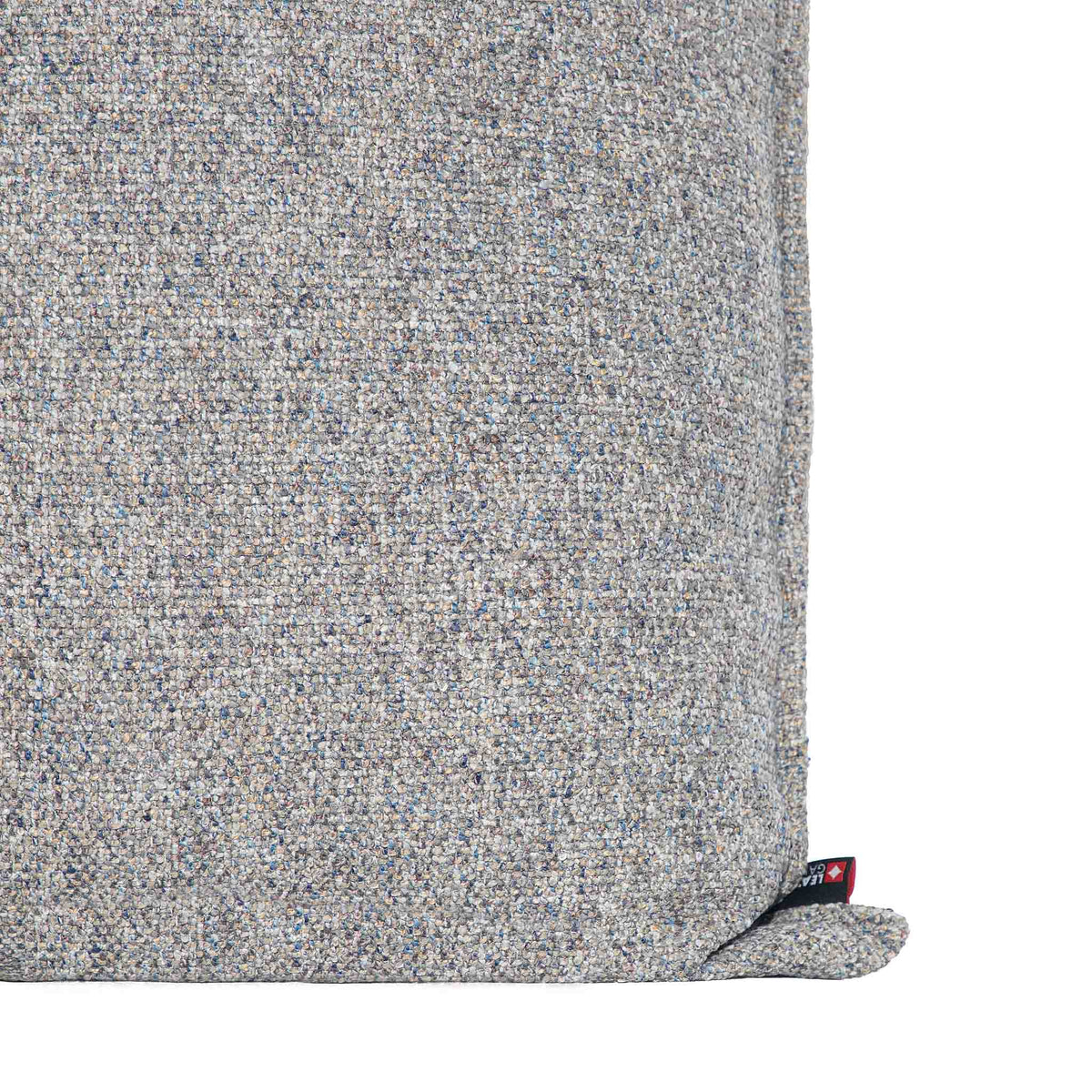 Leather Gallery Aardé Cushion in Storm Slate, featuring a textured woven finish in soft grey, charcoal and neutral tones.