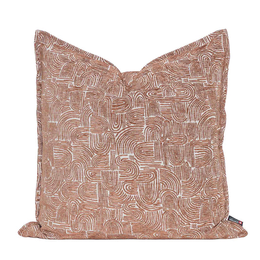 Leather Gallery Arc-Canyon Rust Cushion, featuring a warm rust abstract arch pattern with repeating curved line detailing.