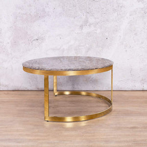 Angled top view of the Waldorf Round Coffee Table Set, featuring its marble-look surface and sleek design. 