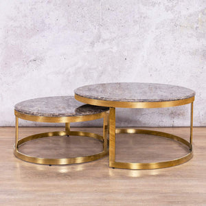 Front view of the Waldorf Round Coffee Table Set showcasing the marble-look top and brown metal base.