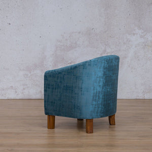 Angled back view of the Club Fabric Tub Armchair | tub chairs South Africa | Fabric Armchair Leather Gallery 